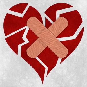 Image of a bandaged and hopeless broken heart shape