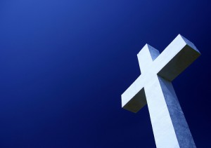 Photo of a Cross with blue sky in the background